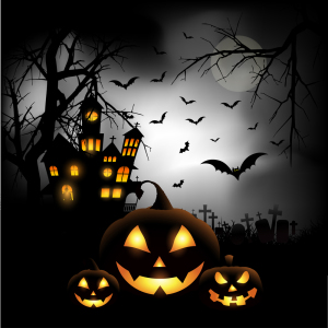 Spooky Halloween background with pumpkins in a cemetery