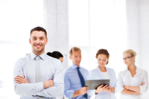 picture of smiling handsome businessman in office